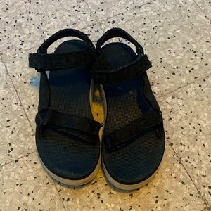 Black and cream Teva sandals